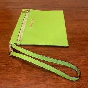 Brand new, authentic, rare color  green leather MIchael Kors wristlet. Must!